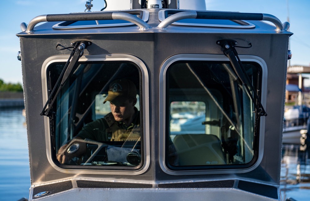 Securing the Seas: 6th Security Forces Marine Patrol on Duty