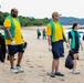 U.S. Navy Sailors clean up litter on a beach in Panama