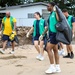 U.S. Navy Sailors clean up litter on a beach in Panama