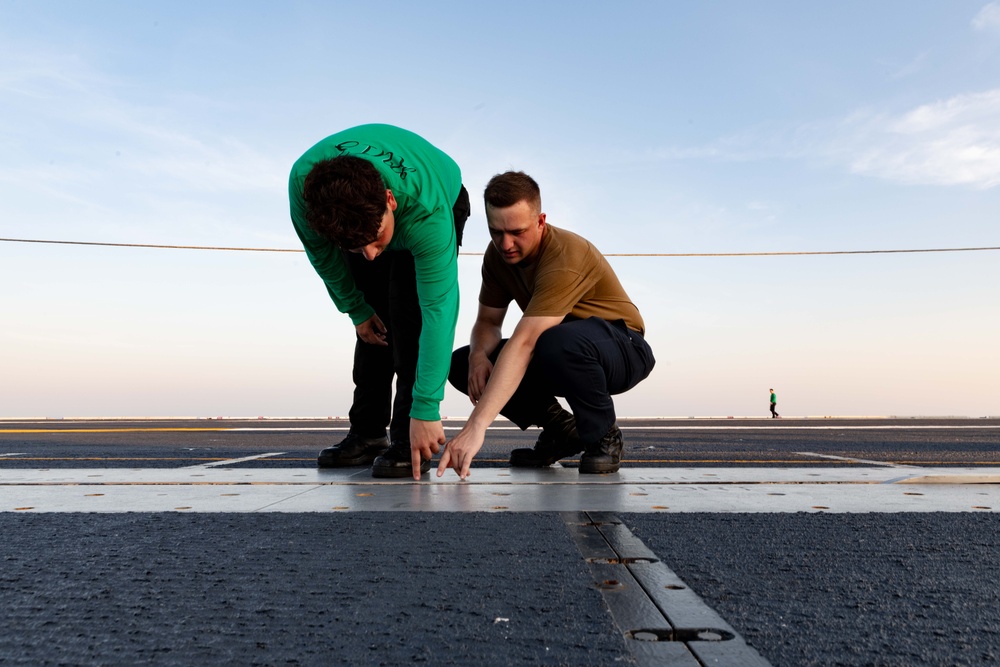 Sailors Conduct Maintenance On the Flight Deck of USS Gerald R. Ford (CVN 78)