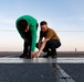 Sailors Conduct Maintenance On the Flight Deck of USS Gerald R. Ford (CVN 78)