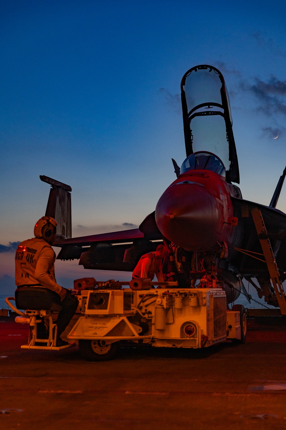 Sailors Transport Aircraft from the Flight Deck to the Hangar Bay on USS Gerald R. Ford (CVN 78)