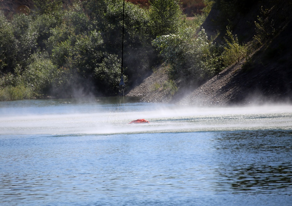 Army National Guard and Central Pierce Fire Department Conduct Water Bucket Training