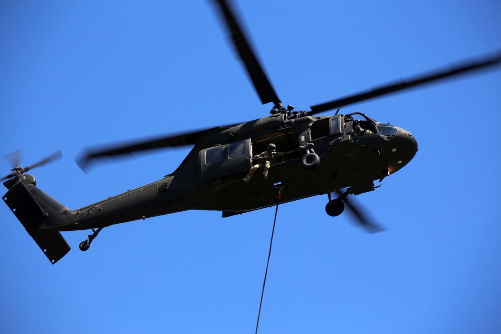Army National Guard and Central Pierce Fire Department Conduct Water Bucket Training
