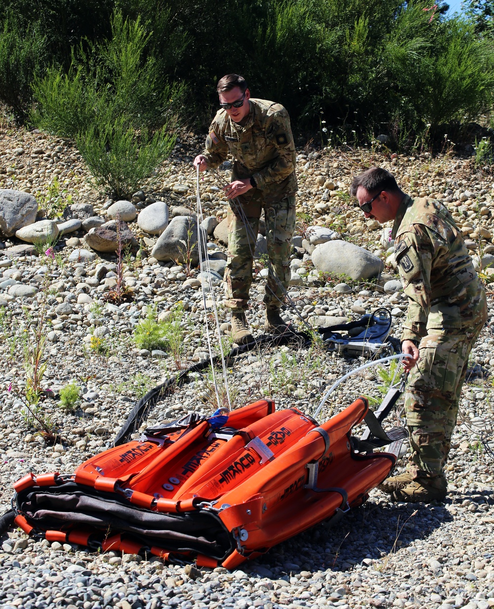 Army National Guard and Central Pierce Fire Department Conduct Water Bucket Training