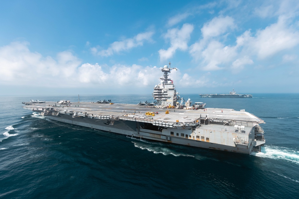 USS Gerald R. Ford (CVN 78) Conducts Vertical Replenishment with USS George H. W. Bush (CVN 77)