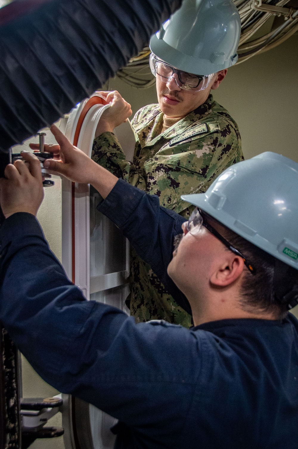 Ronald Reagan Sailors Conduct Maintenance