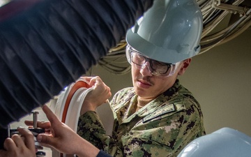 Ronald Reagan Sailors Conduct Maintenance