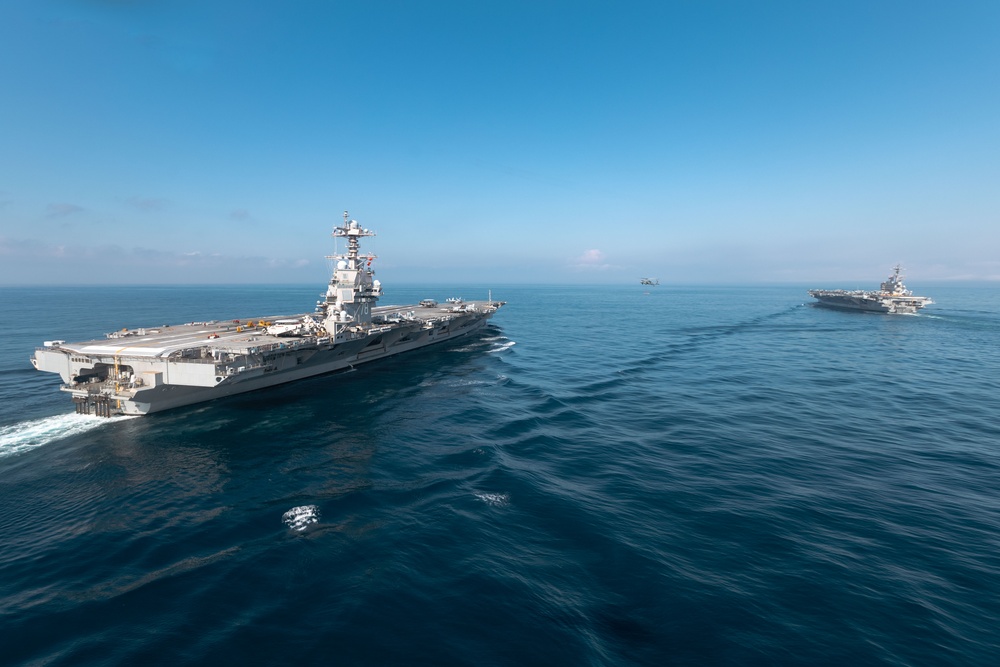 USS Gerald R. Ford (CVN 78) Conducts Vertical Replenishment with USS George H. W. Bush (CVN 77)