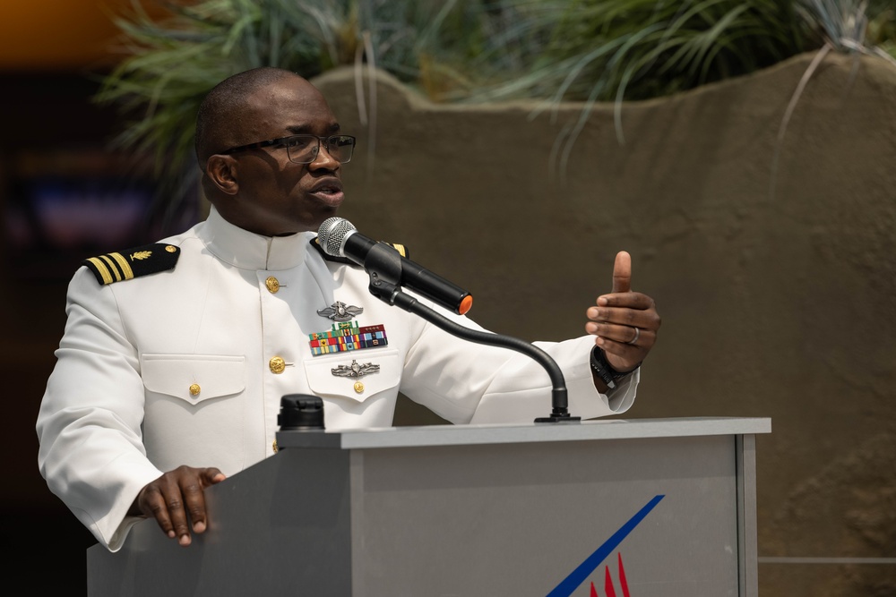 U.S. Navy HM2 Dailey commissions as an Ensign