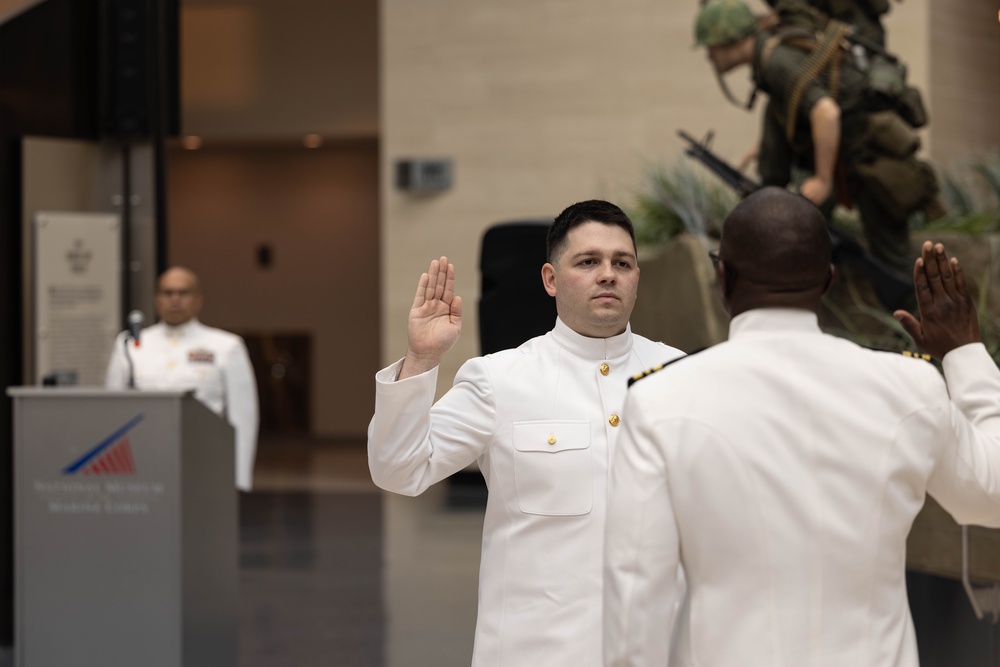 U.S. Navy HM2 Dailey commissions as an Ensign