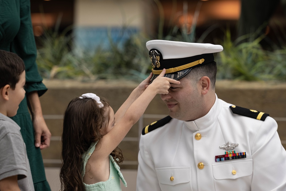U.S. Navy HM2 Dailey commissions as an Ensign