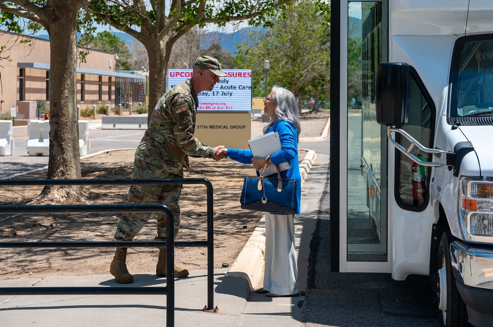 Col. Steven Fox Greets Mrs. Christine Grady