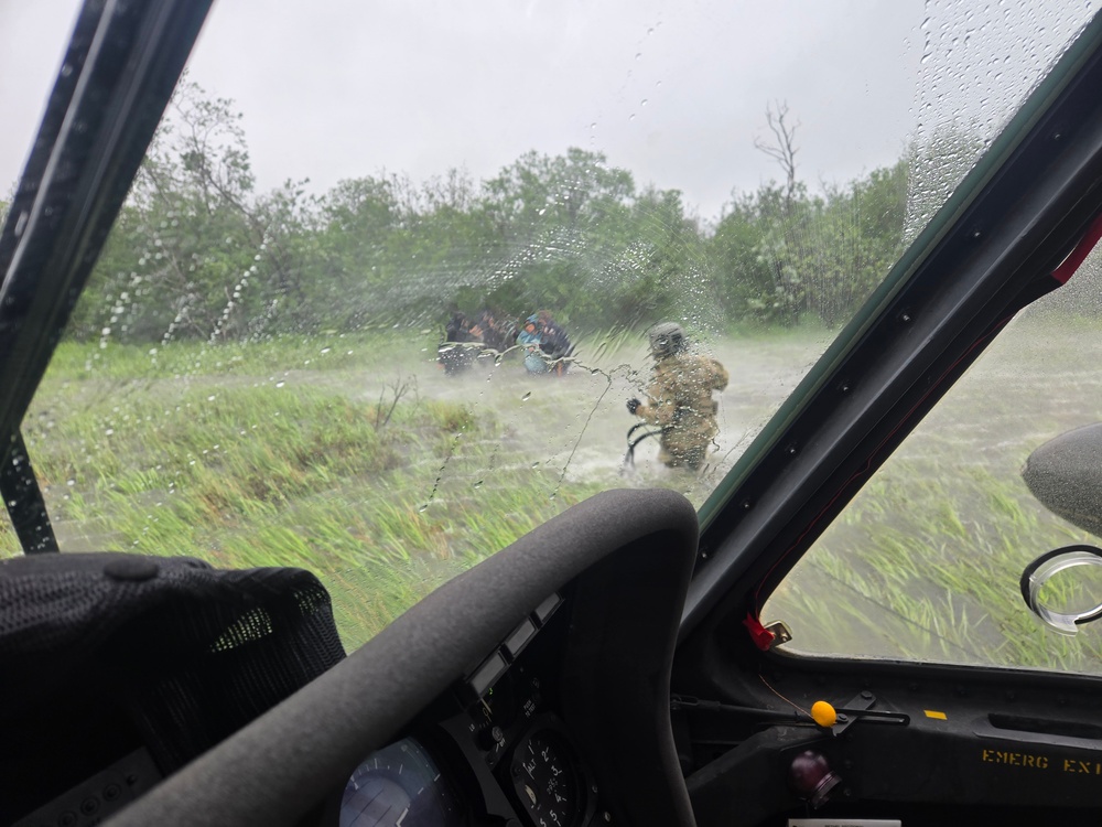 Alaska Army Guard aviators rescue family of 6, stranded on Kuskokwim River during summer storm
