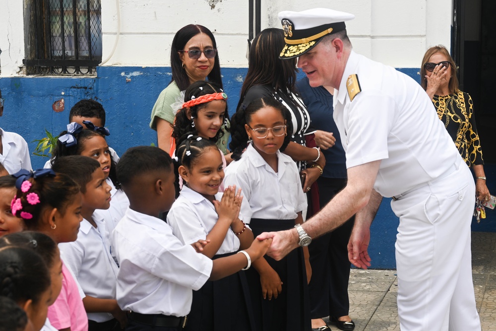 U.S. Navy Rear Adm. Richard S. Lofgren visits Panama school with the Seabees
