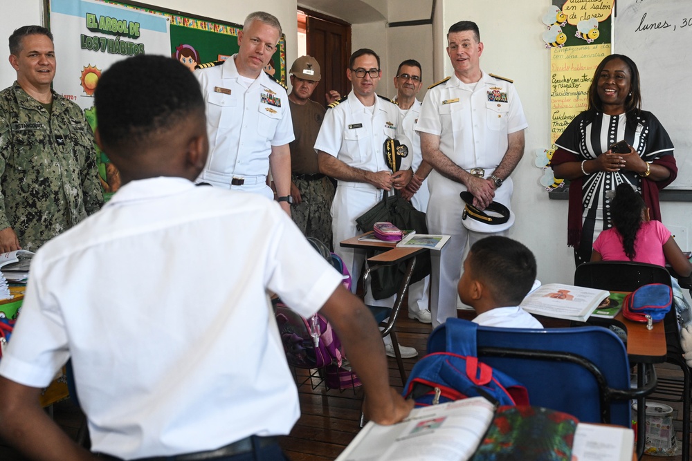 U.S. Navy Rear Adm. Richard S. Lofgren visits Panama school with the Seabees