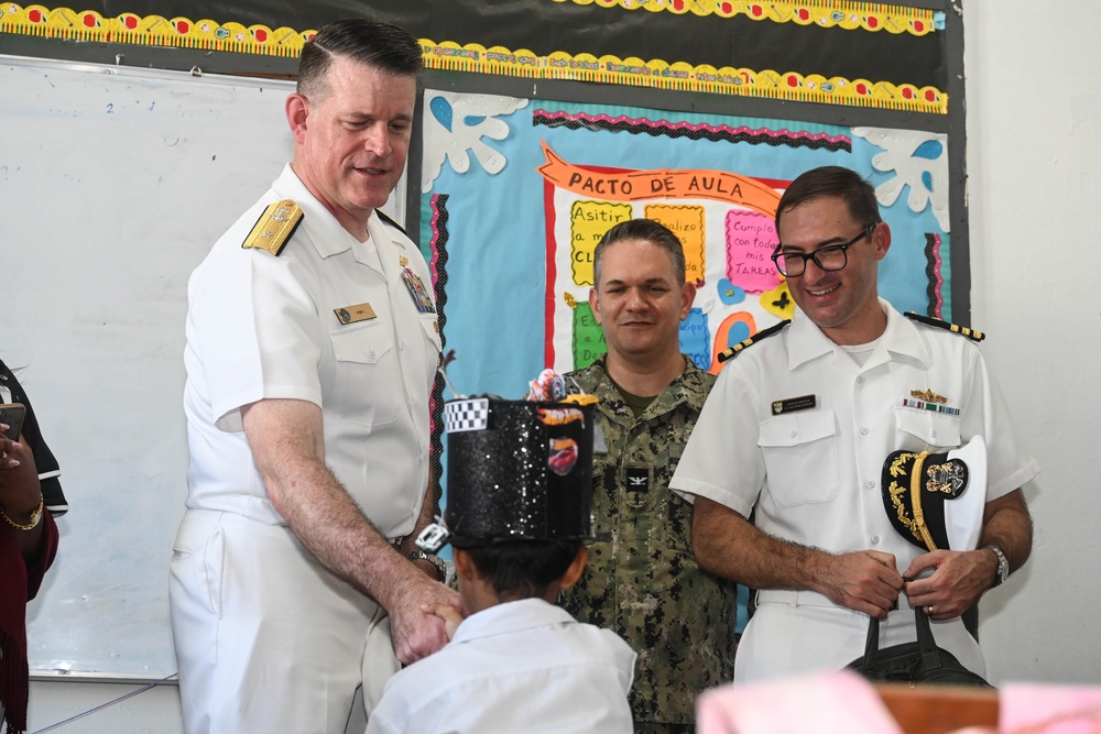 U.S. Navy Rear Adm. Richard S. Lofgren visits Panama school with the Seabees