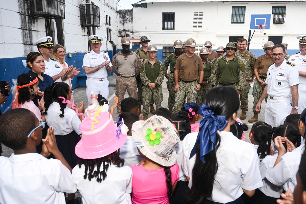 U.S. Navy Rear Adm. Richard S. Lofgren visits Panama school with the Seabees