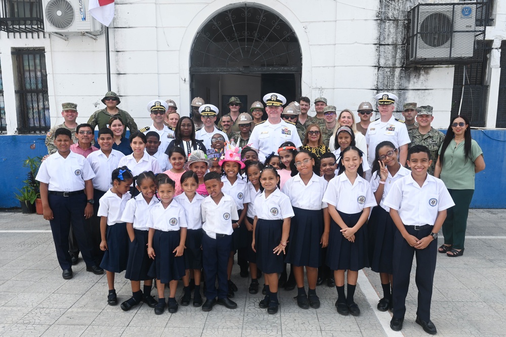 U.S. Navy Rear Adm. Richard S. Lofgren visits Panama school with the Seabees