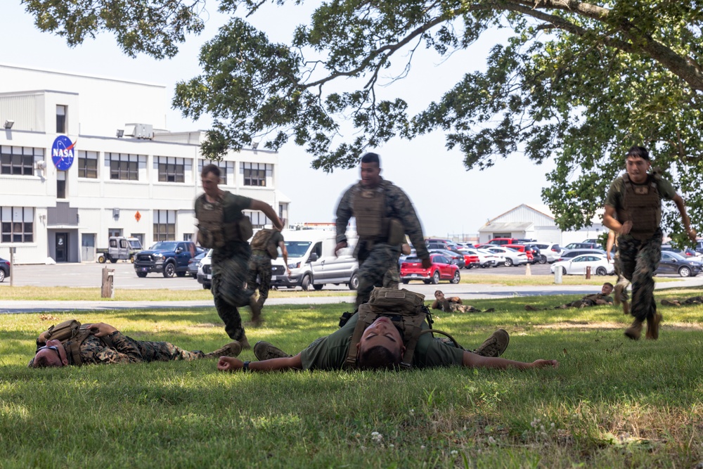 U.S. Marines with MWSS-273 conduct simulated tactical combat casualty care