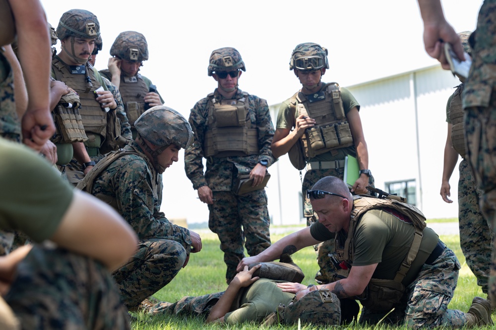 U.S. Marines with MWSS-273 conduct simulated tactical combat casualty care