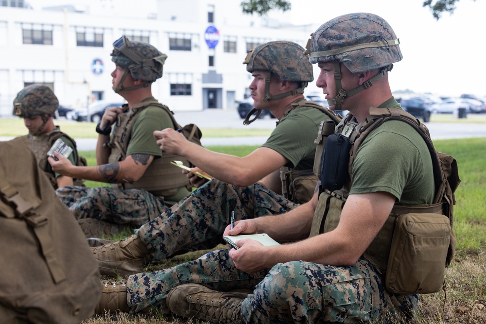 U.S. Marines with MWSS-273 conduct simulated tactical combat casualty care