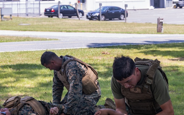 U.S. Marines with MWSS-273 conduct simulated tactical combat casualty care