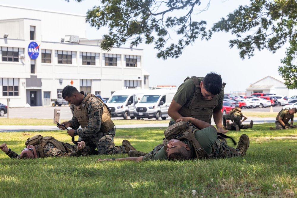 U.S. Marines with MWSS-273 conduct simulated tactical combat casualty care