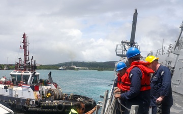 Sailors aboard the USS John Finn conduct a sea and anchor detail in Apra Harbor, Guam