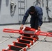 Sailors aboard the USS John Finn conduct a passenger transfer in the Philippine Sea