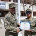 NMCB 4 Lieutenant Awarded SCW, EXW, NAM at Once