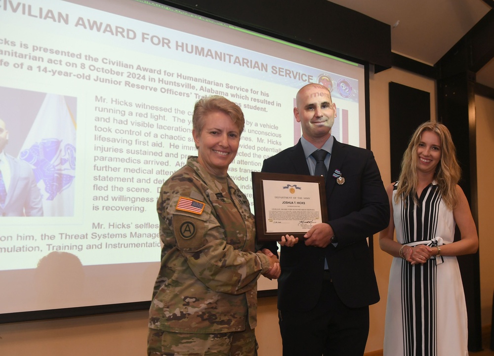 Civilian Employee Receives Humanitarian Service Medal