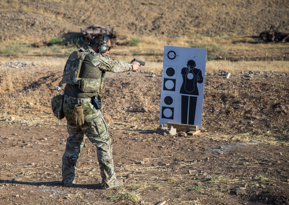 Coalition Members Conduct Weapons Training at Beneslawa Range