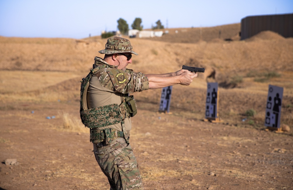 Coalition Members Conduct Weapons Training at Beneslawa Range