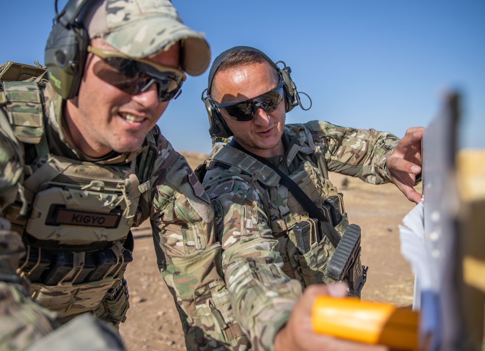 Coalition Members Conduct Weapons Training at Beneslawa Range