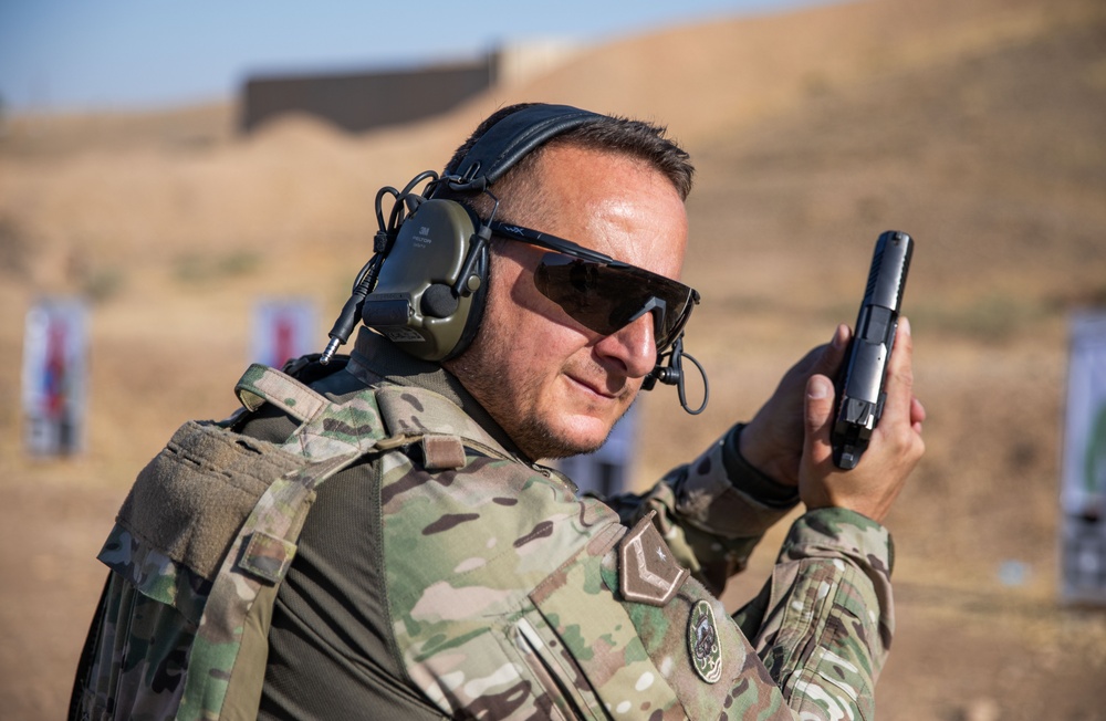Coalition Members Conduct Weapons Training at Beneslawa Range