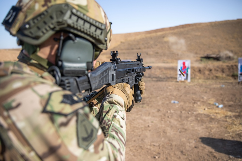 Coalition Members Conduct Weapons Training at Beneslawa Range