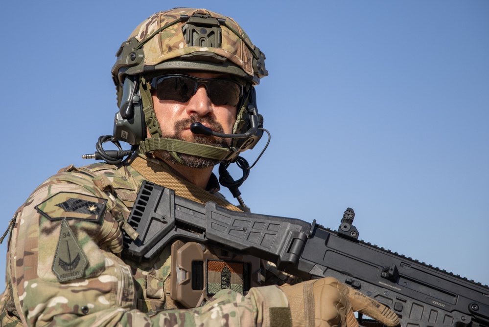 Coalition Members Conduct Weapons Training at Beneslawa Range