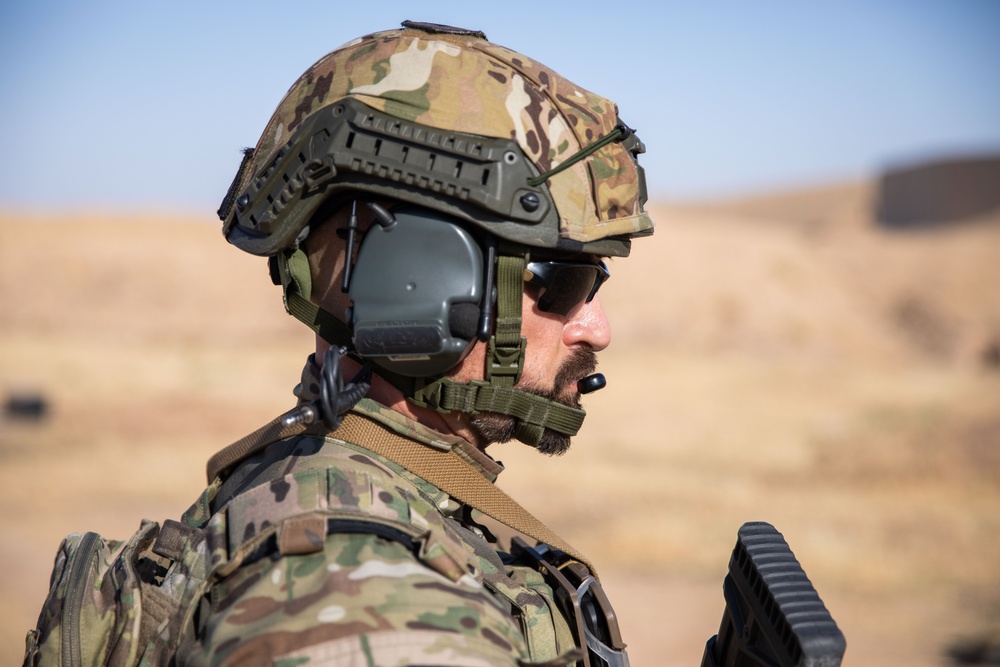 Coalition Members Conduct Weapons Training at Beneslawa Range