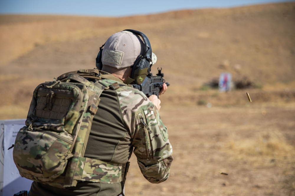Coalition Members Conduct Weapons Training at Beneslawa Range