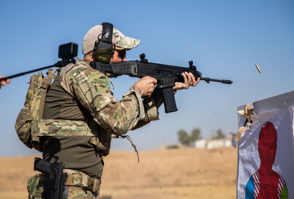 Coalition Members Conduct Weapons Training at Beneslawa Range