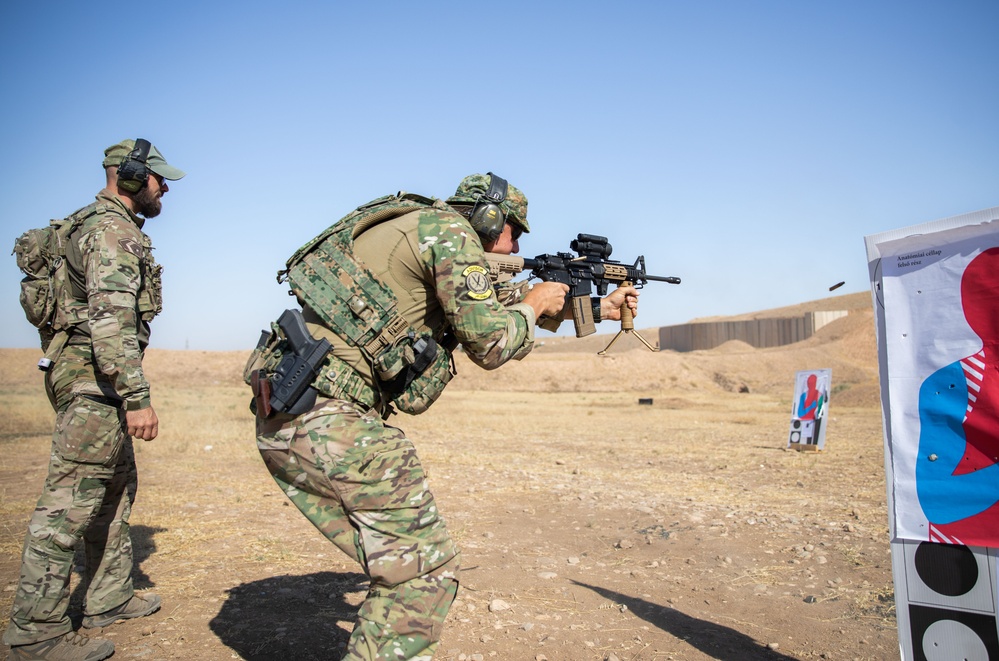 Coalition Members Conduct Weapons Training at Beneslawa Range