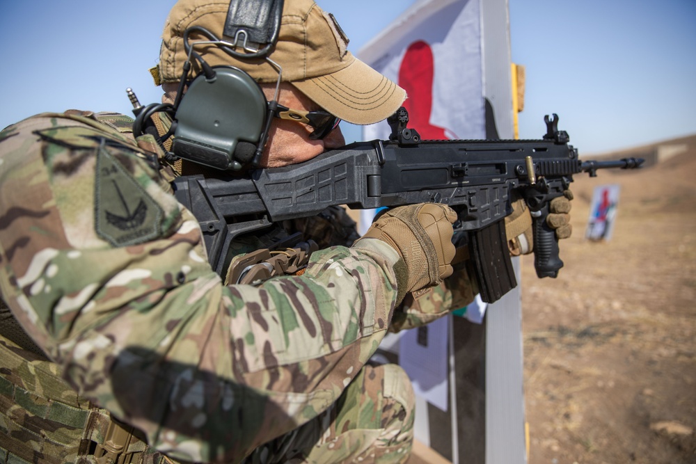 Coalition Members Conduct Weapons Training at Beneslawa Range