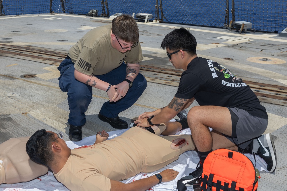 Tactical Combat Casualty Care drill on USS Paul Ignatius