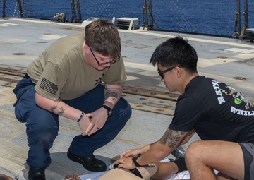Tactical Combat Casualty Care drill on USS Paul Ignatius