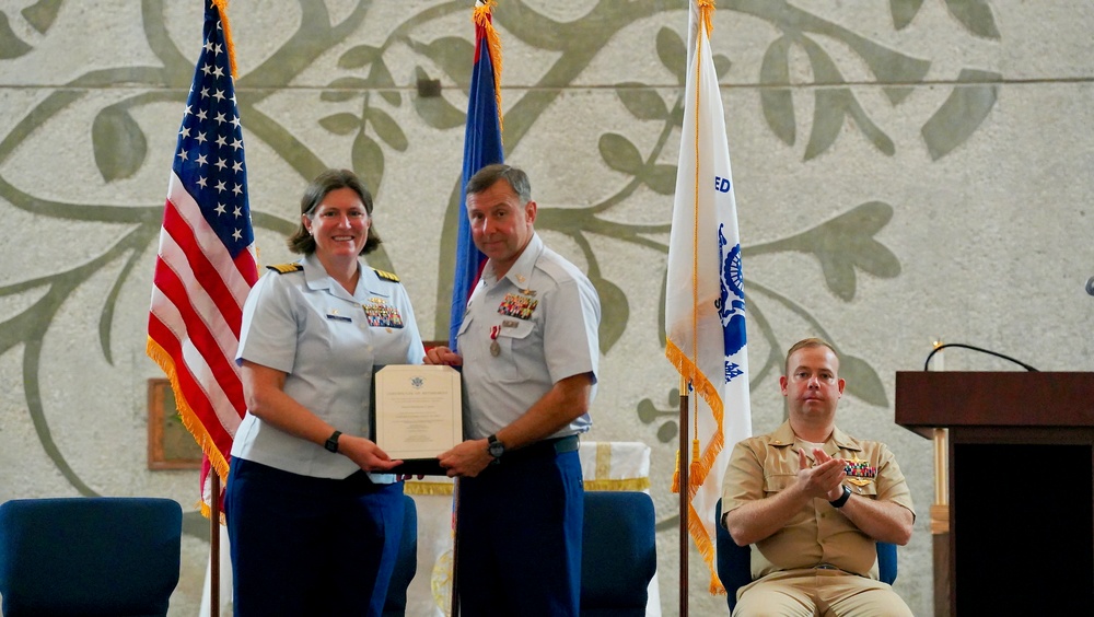 New officer-in-charge at the helm of Station Apra Harbor, Senior Chief Jarvis retires