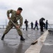 USS PEARL HARBOR (LSD 52) Sailors man the rails as the ship departs for Pacific Partnership 2025