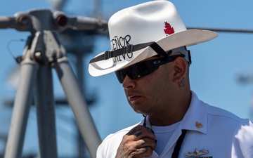 USS PEARL HARBOR (LSD 52) Sailors man the rails as the ship departs for Pacific Partnership 2025