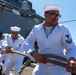 USS PEARL HARBOR (LSD 52) Sailors man the rails as the ship departs for Pacific Partnership 2025