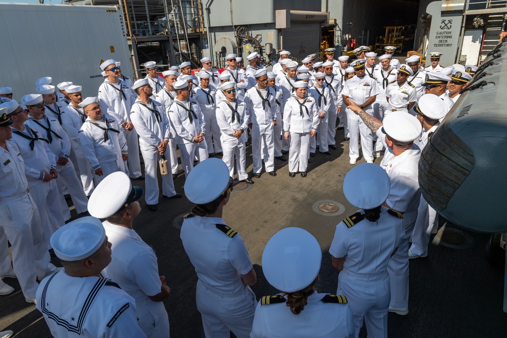 USS PEARL HARBOR (LSD 52) Sailors conduct a brief as the ship prepares to depart for Pacific Partnership 2025